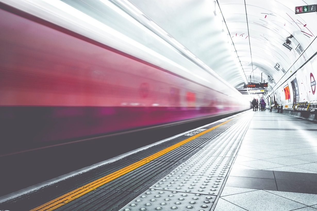 fast train moving through a subway railway station